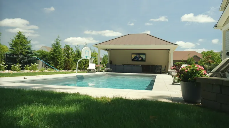View across the lawn to the pool and pool house
